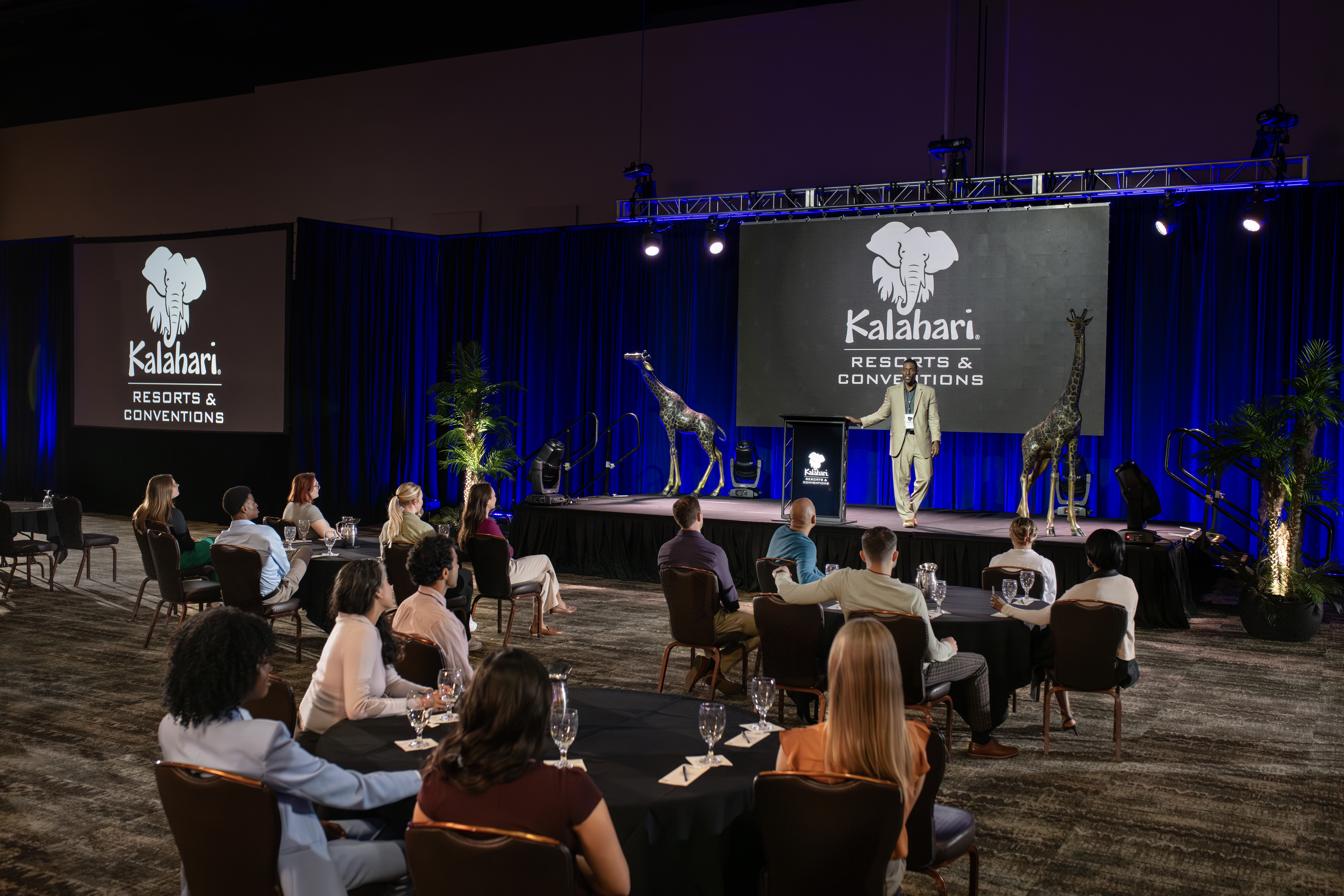 Man standing up giving a presentation