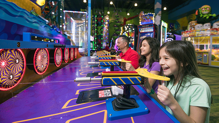 Family Playing the Arcade
